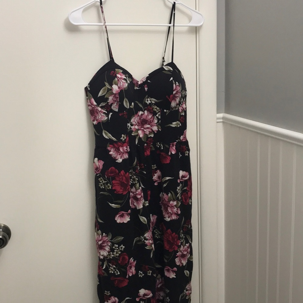 It’s a flower printed romper with pockets